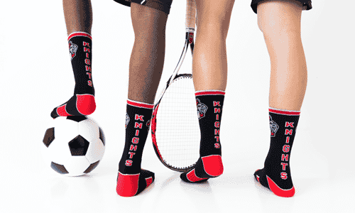 students wearing custom socks by spirit sox usa that have their school mascot on them