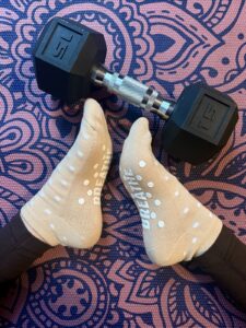 a pair of white gym brippy socks