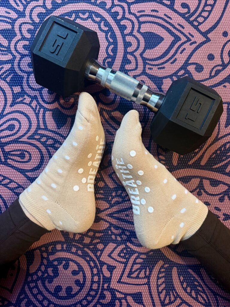 a pair of white gym brippy socks