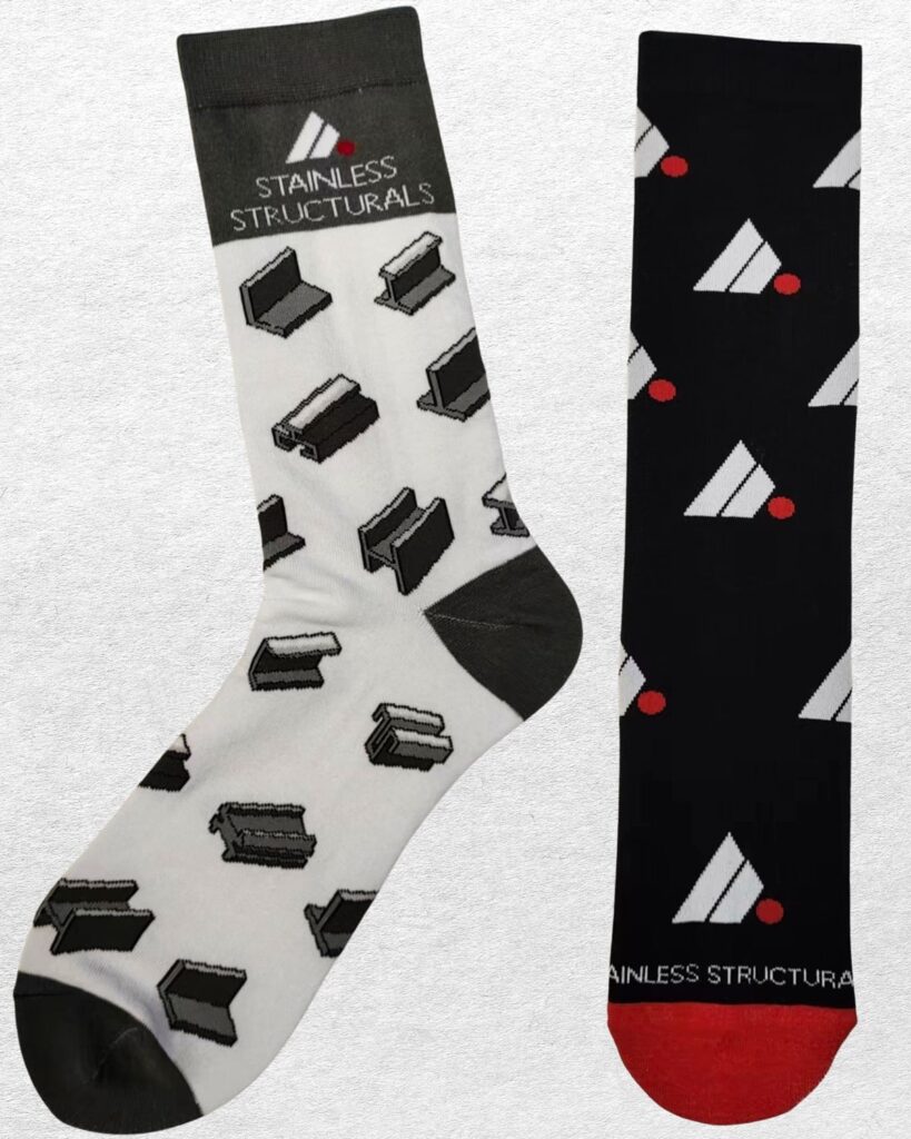a pair of regular cotton socks with custom black and white design