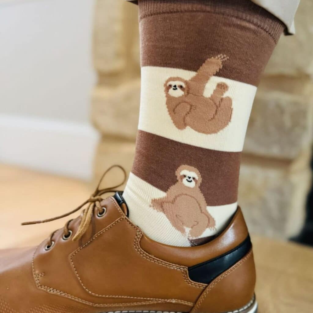 brown and white custom socks with tree sloths