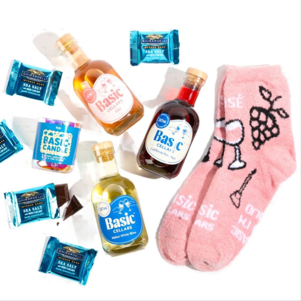 pink custom socks in a swag bag of goodies
