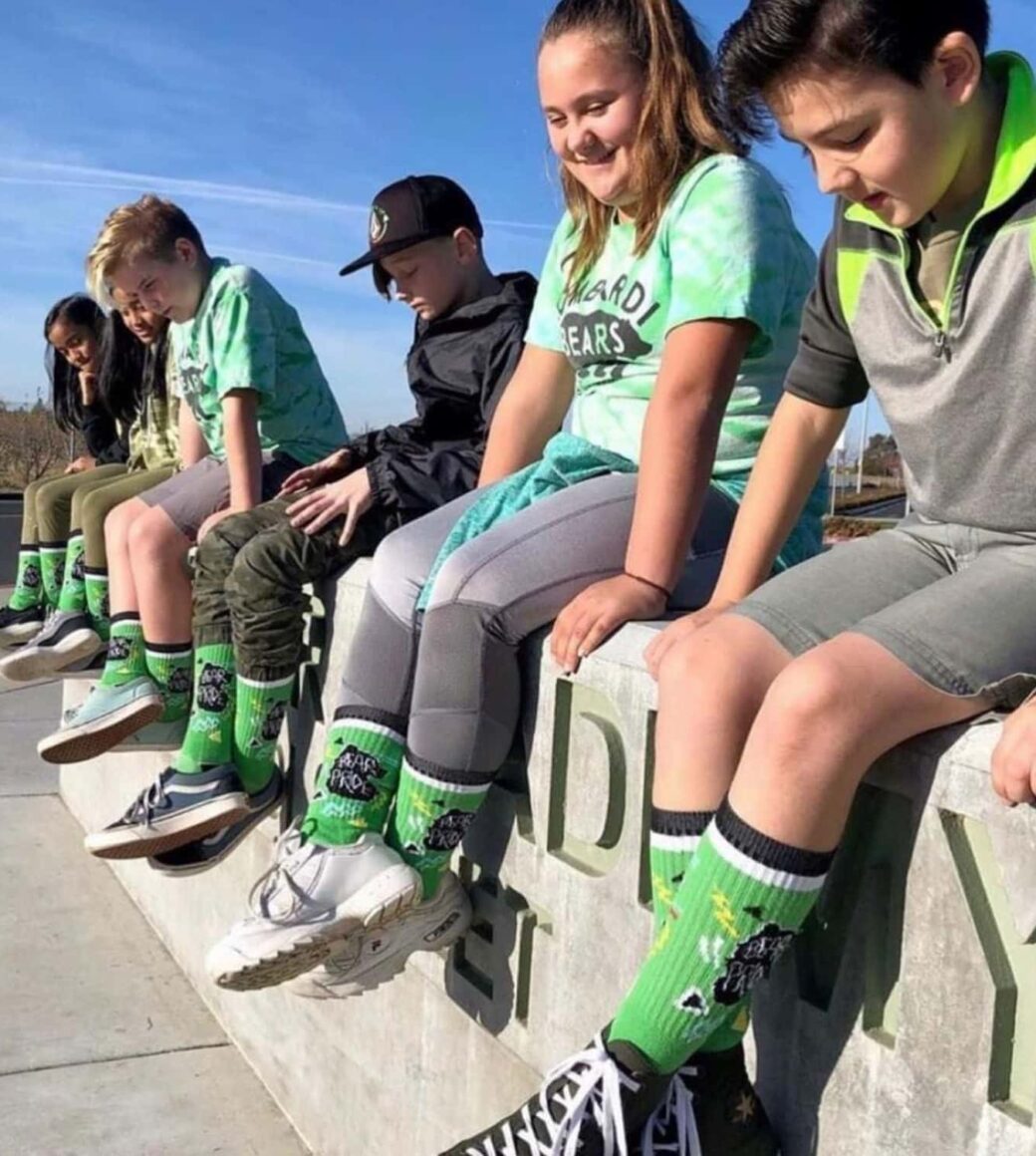 a youth sports team wearing custom socks from spirit sox usa