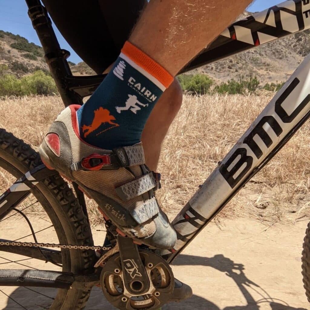 a biker wearing a pair of customized sporting socks