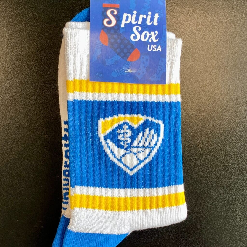 a pair of custom branded socks from Spirit Sox usa as client gifts