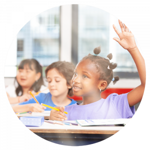 girl raising her hand in classroom